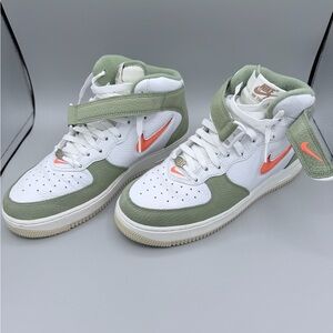 Nike Mid-Top Sneakers in White, Olive Green, and Orange Swoosh